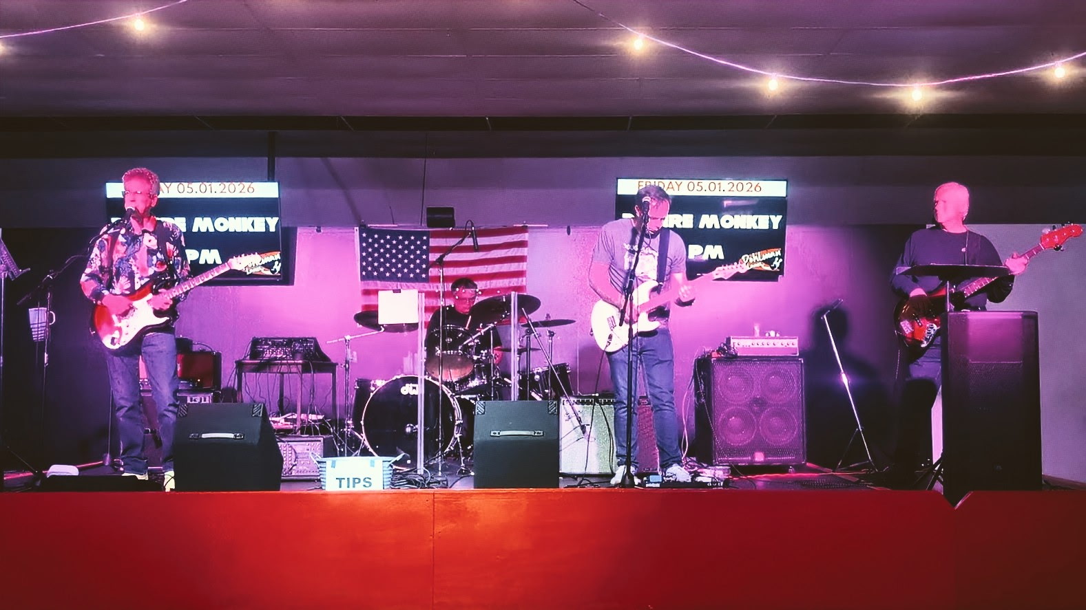 3 Wire Monkey performing on a wide outdoor stage
